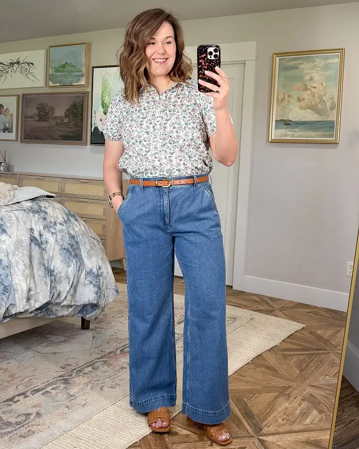 20 Work Outfits for Women Over 40 That Look Effortlessly Polished 21 Floral Blouse with Wide Leg Trouser Jeans