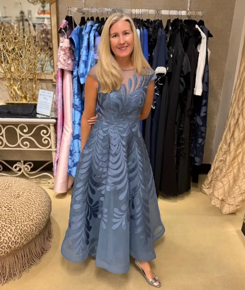 15 Winter Wedding Guest Outfits Over 40 That Handle the Cold 8 Slate Blue Tea Length Gown With Appliqué