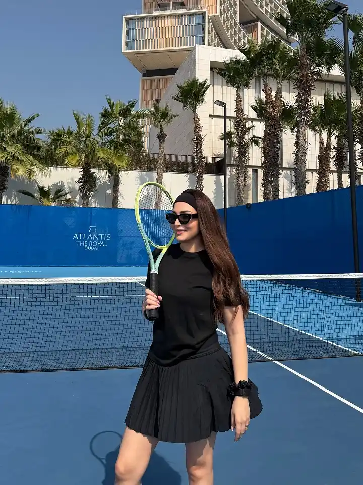 All Black Tee and Pleated Skirt Separates for Resort Tennis Trips