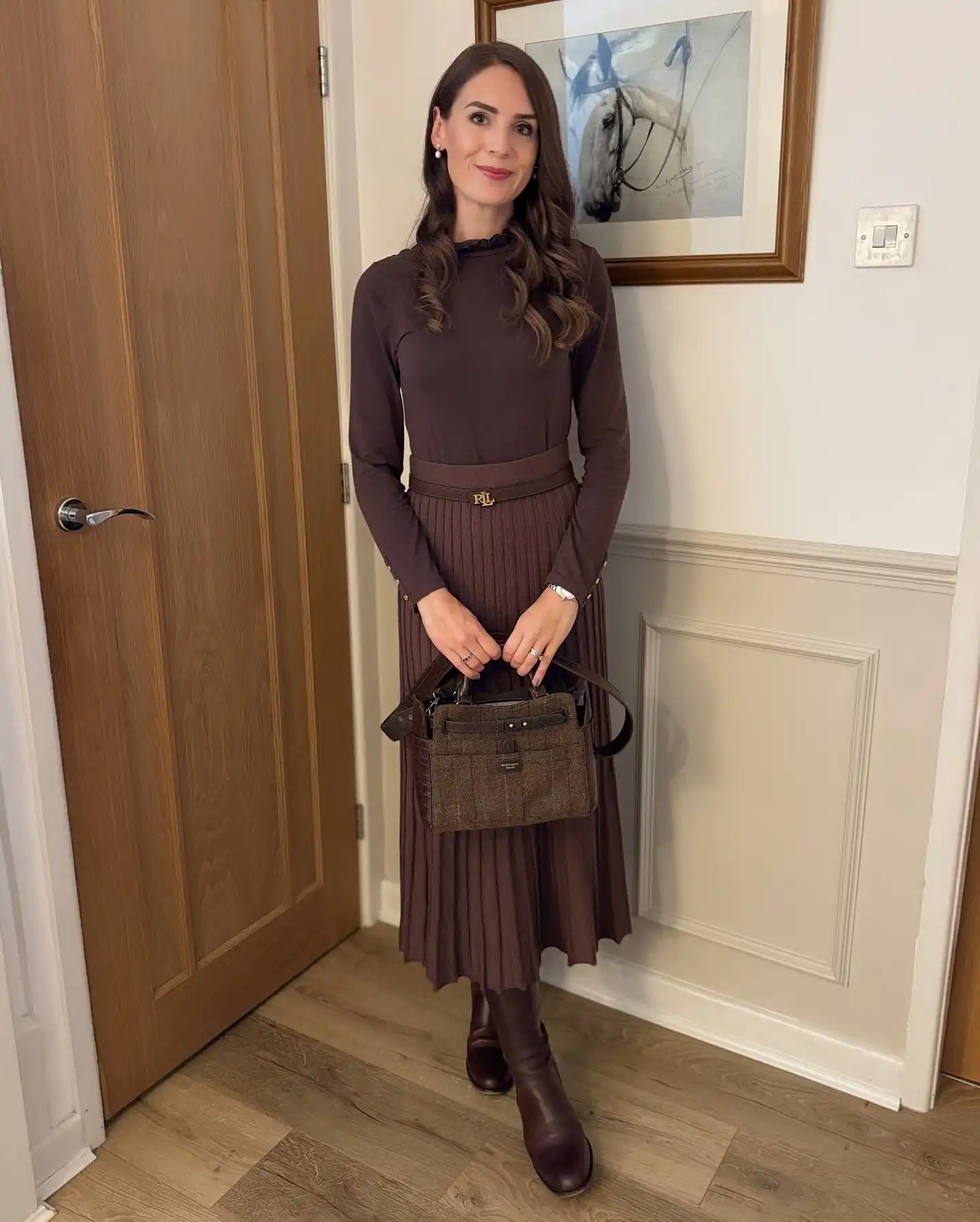 2. Monochrome Brown Midi with Pleated Skirt