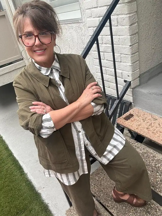 20 Work Outfits for Women Over 40 That Look Effortlessly Polished 20 Olive Chore Jacket over a Striped Shirt