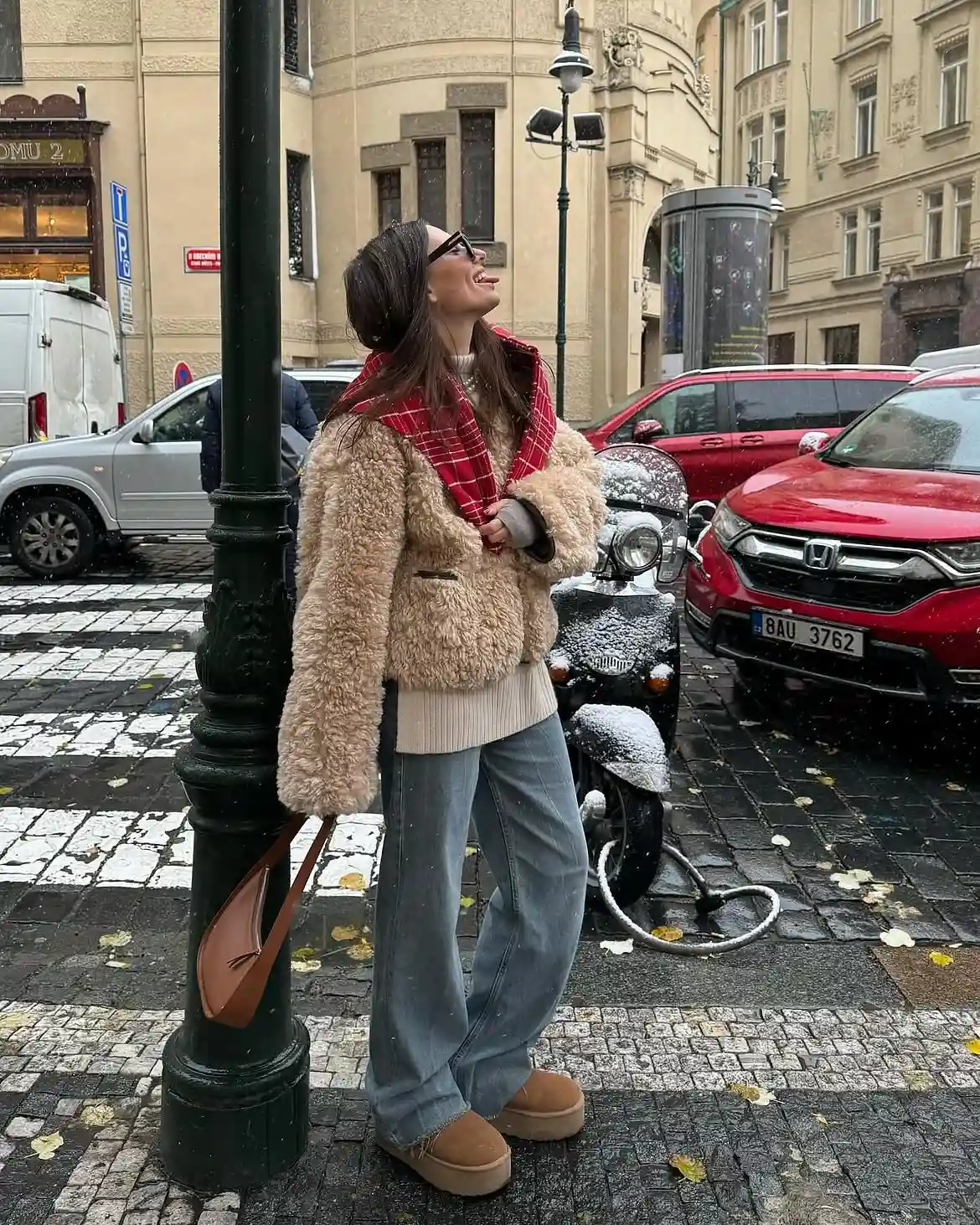 19 Winter Vacation Outfits Over 40 (Warm Getaways) 3 2. Teddy Jacket and Plaid Scarf for City Snow