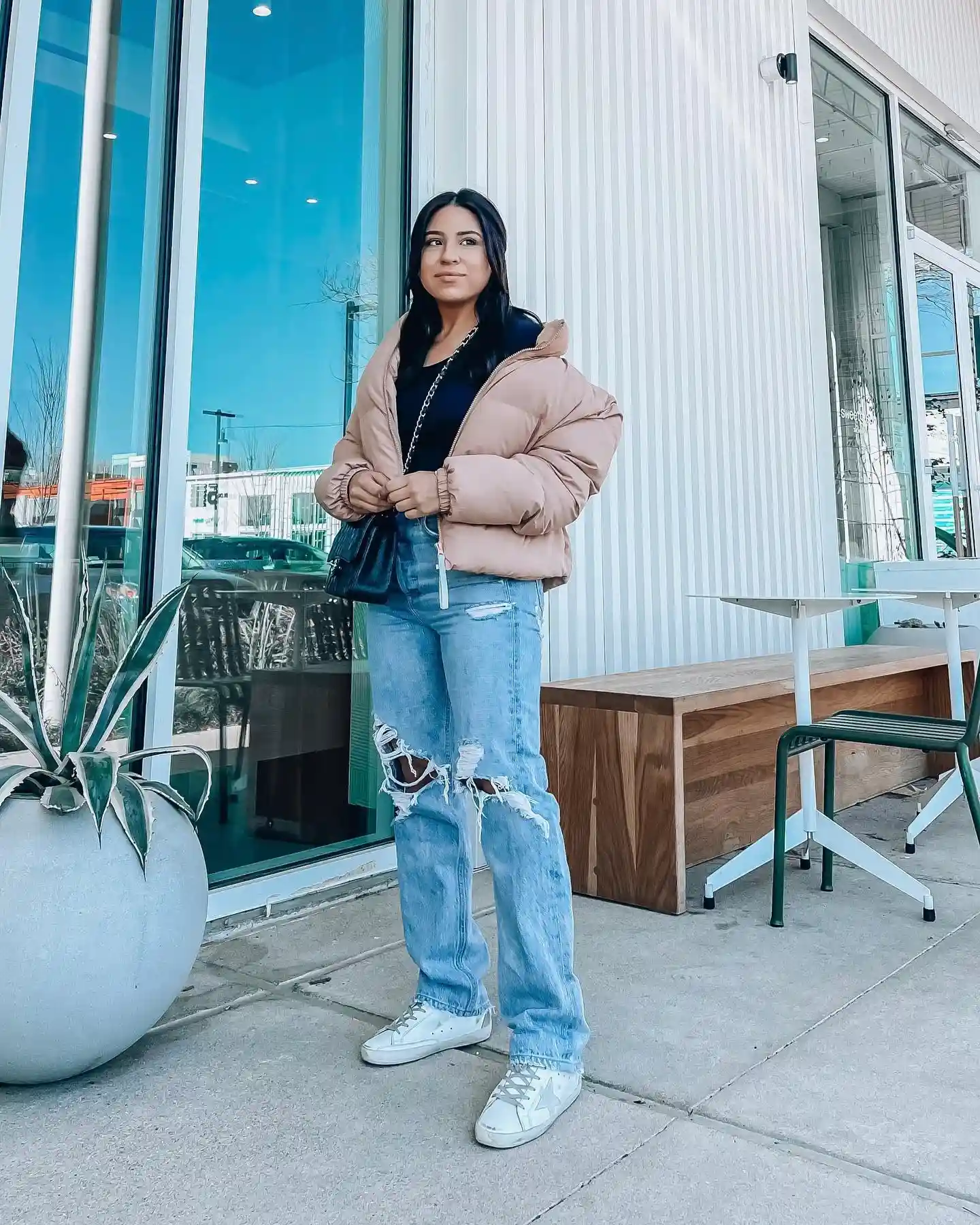 15 Puffer Jacket Outfits for Women Over 40 That Actually Look Chic 7 6. Blush Pink Puffer Softens Distressed Denim