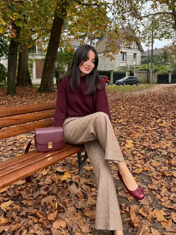 15 Fall Transitional Outfits for Women Over 40 (Summer-to-Fall) 3 2. Burgundy Knit With Oatmeal Wide Leg Trousers