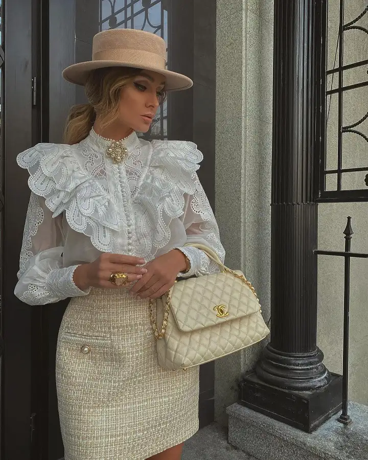 20 Quiet Luxury Outfits for Women Over 40 (Old Money Style, Real-Life Ready) 2 Lace Ruffle Blouse With a Cream Tweed Skirt