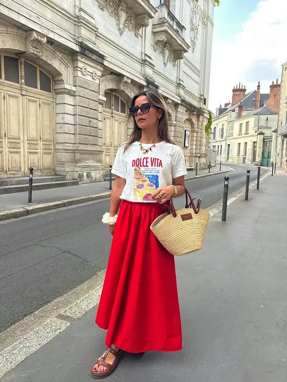 15 European Vacation Outfits for Women Over 40 7 Graphic Tee with a Red Maxi Skirt