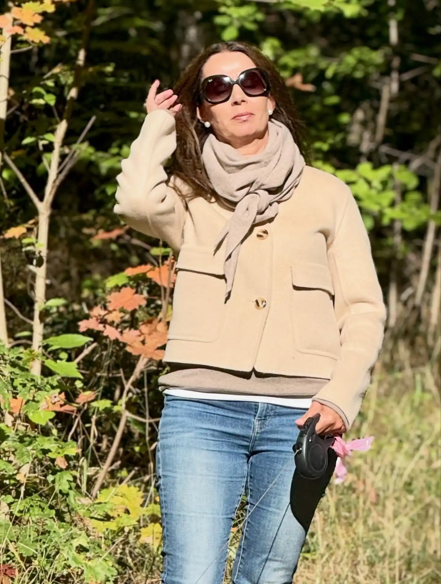 15 Cashmere Outfits for Women Over 40 That Feel Cozy and Polished 8 7. Taupe Scarf and Cropped Beige Jacket With Blue Jeans