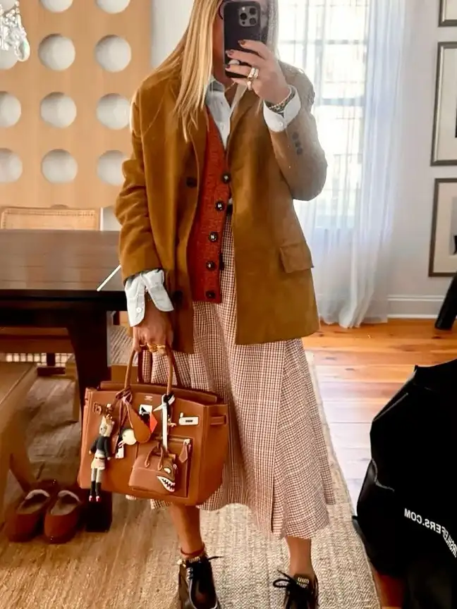 18 Preppy Outfits for Women Over 40 4 Camel Suede Blazer, Rust Cardigan, and a Gingham Midi Skirt