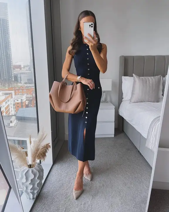 18 Spring Work Outfits for Women Over 40 That Feel Fresh, Not Fussy 8 Navy Ribbed Knit Midi Dress With Gold Buttons