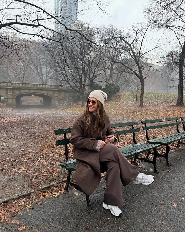 18 Winter 2026 Outfits for Women Over 40 10 A Matching Lounge Set Under a Long Wool Coat for Comfy Weekend Outings